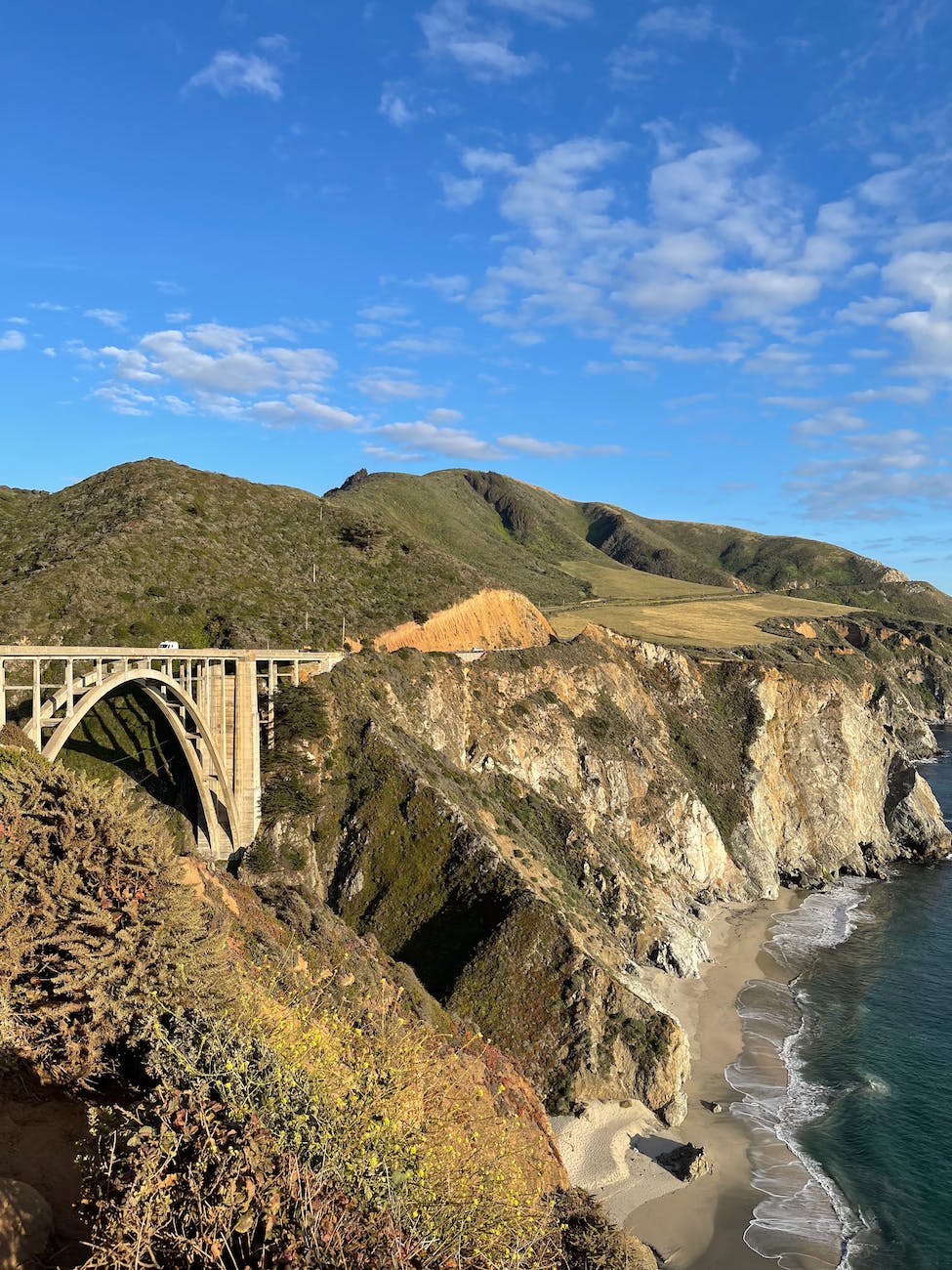 bixby creek bridge under blue sky