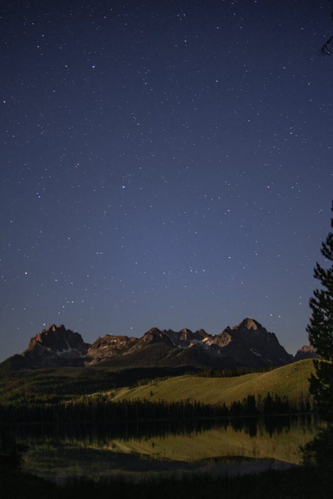 the sawtooth range under a starry blue sky in idaho united states